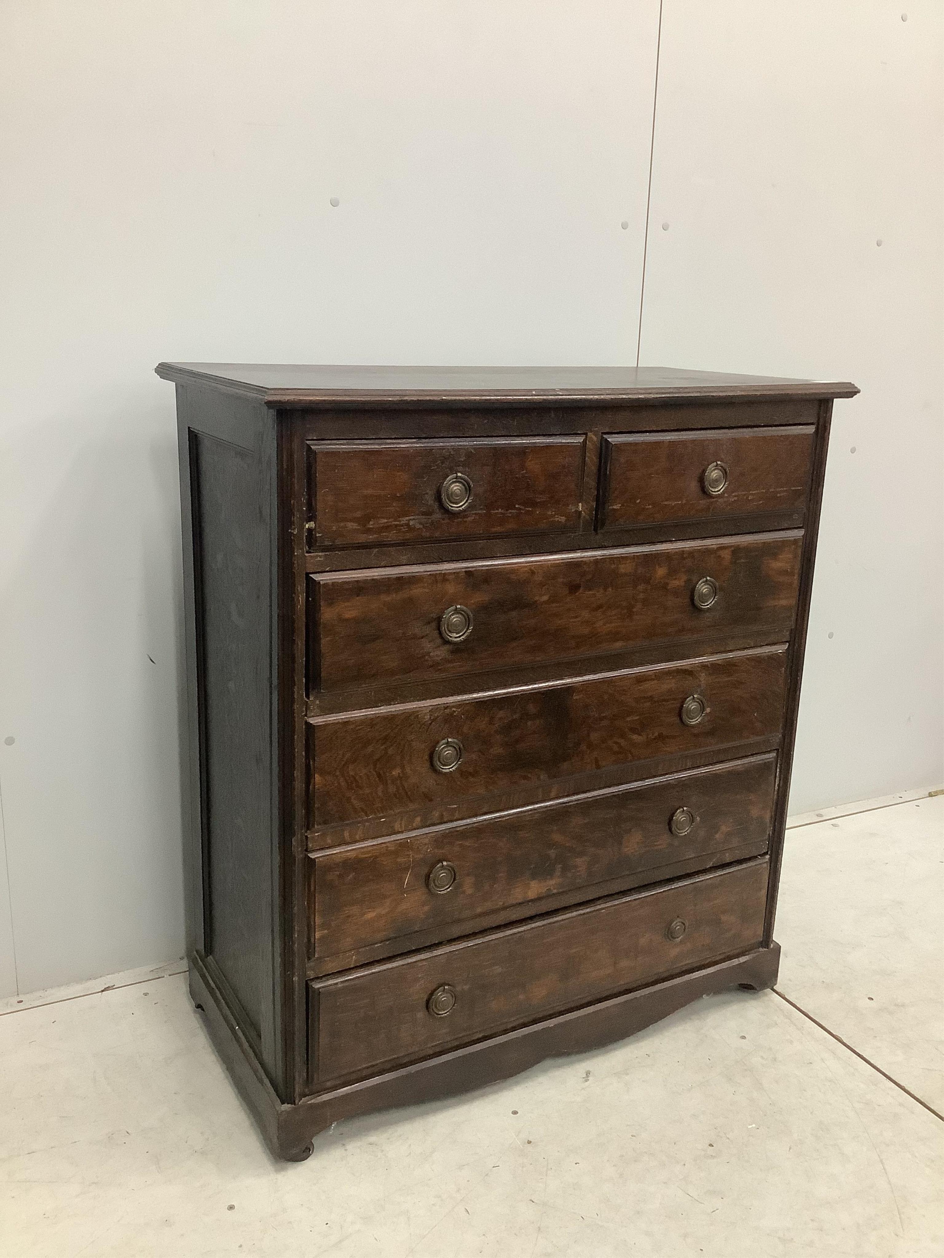 An early 20th century oak chest of drawers, width 96cm, depth 47cm, height 108cm. Condition - fair